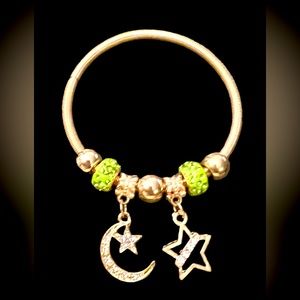 ISABELLA STRETCH BRACELET GOLD TONE with moon and stars NWT